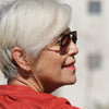 old lady takes CBD for tumor growth